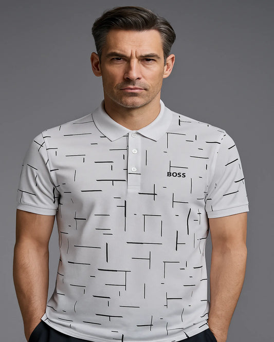 POLO BOSS BLANCO CON ESTAMPADO GEOMÉTRICO Y LOGOTIPO ESTAMPADO