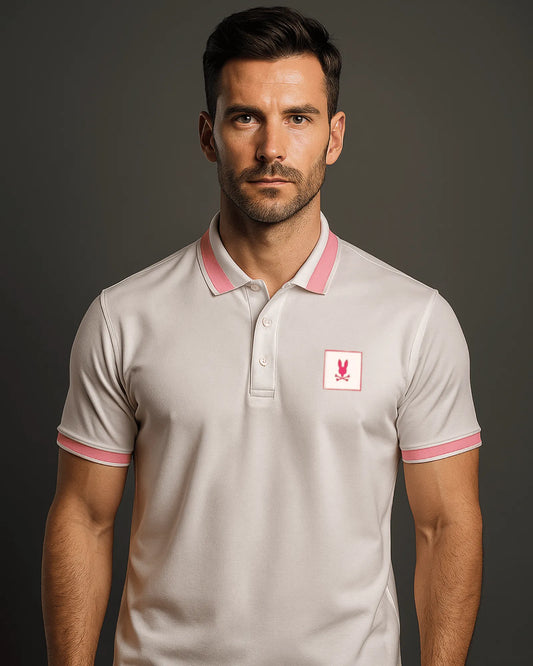 POLO PSYCHO BLANCO, DETALLES ROSA Y LOGOTIPO EN PECHO
